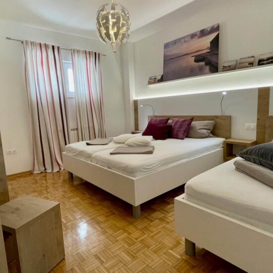 Modern bedroom with two single beds